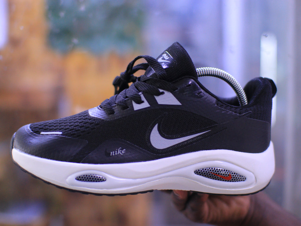 Sleek Black and White Sneakers