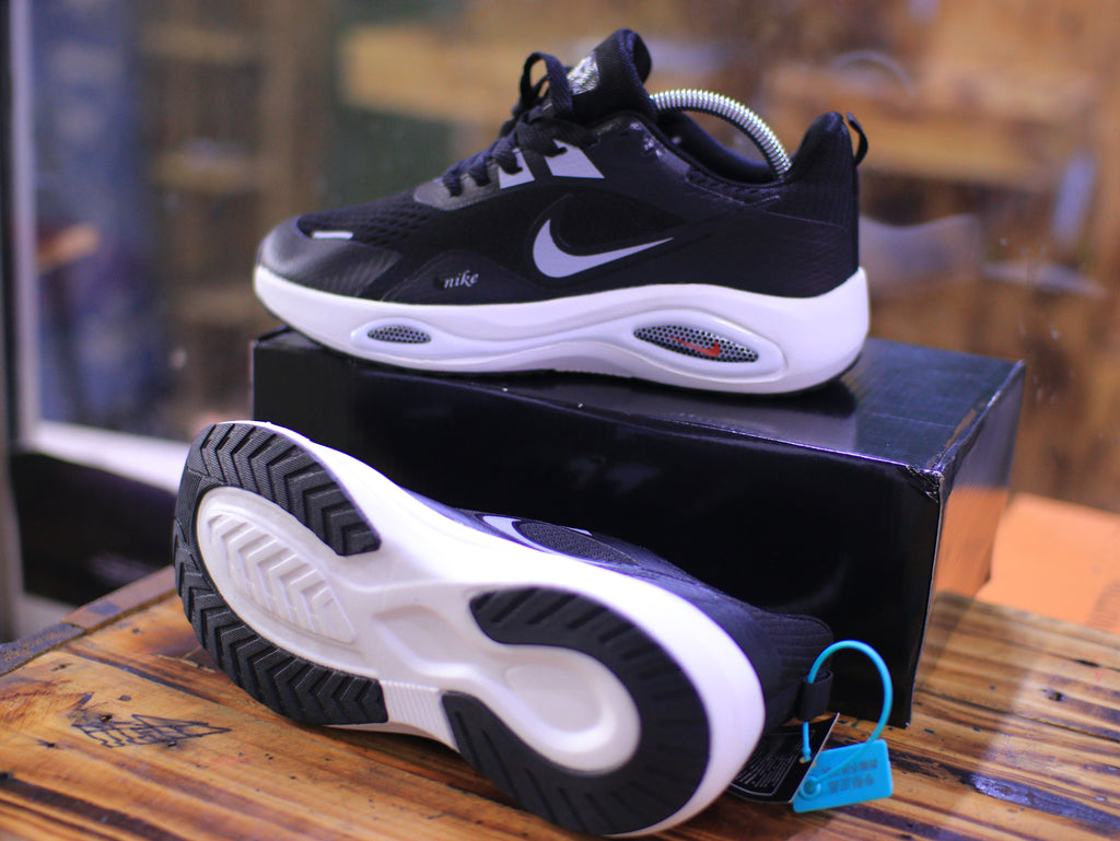 Sleek Black and White Sneakers