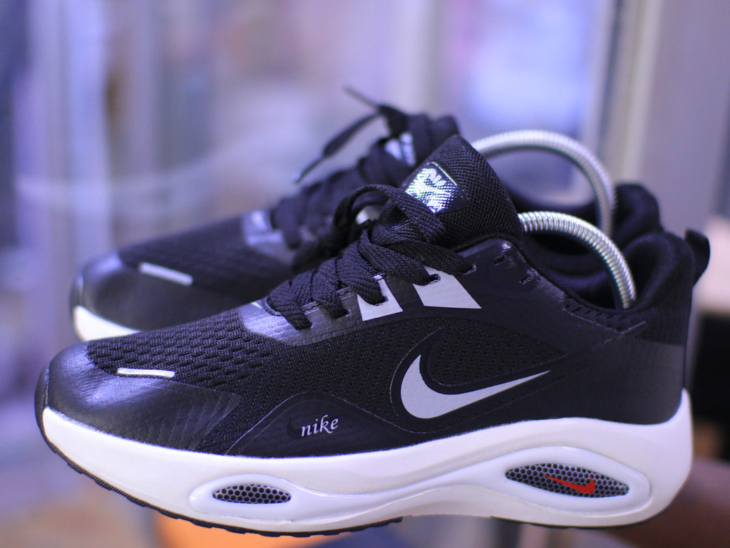 Sleek Black and White Sneakers