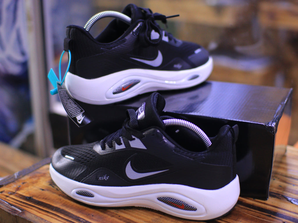 Sleek Black and White Sneakers