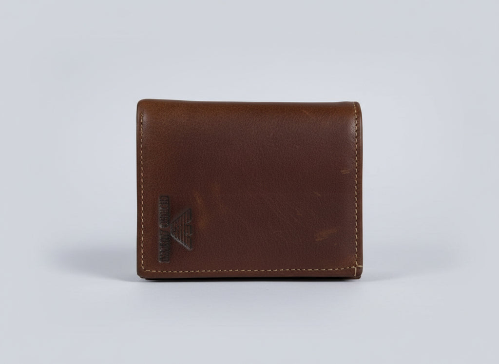 Brown leather wallet with a brand logo on a transparent background