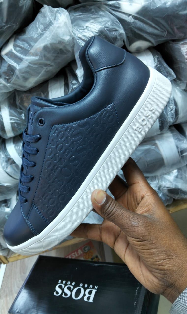 Men’s Luxury Leather Sneakers – Embossed Logo Casual Shoes