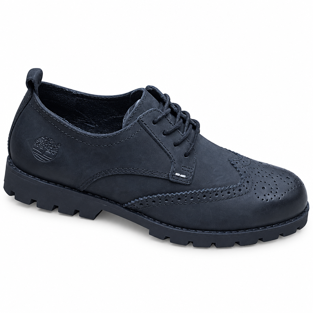 Black brogue-style lace-up shoe with perforated toe and chunky dark sole on white background