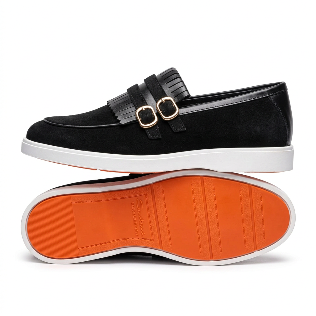 Black double-buckle fringe loafer with white sole and orange outsole view on white