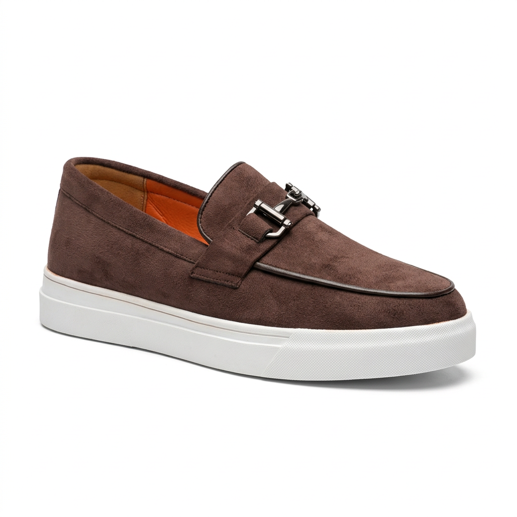 Brown slip-on loafer with metal-bit detail, white sole and orange lining on white