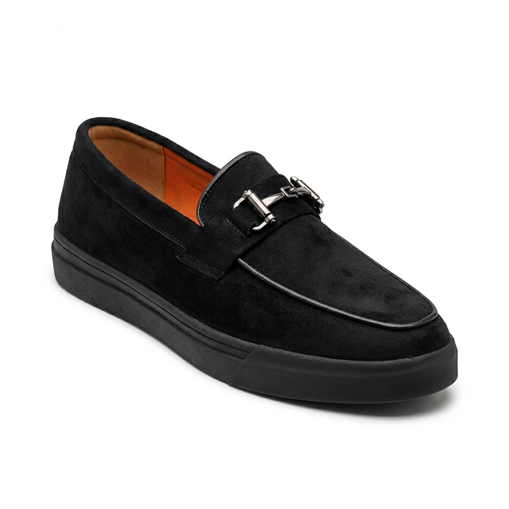 Black slip-on loafer with metal-bit detail, black sole and orange lining on white