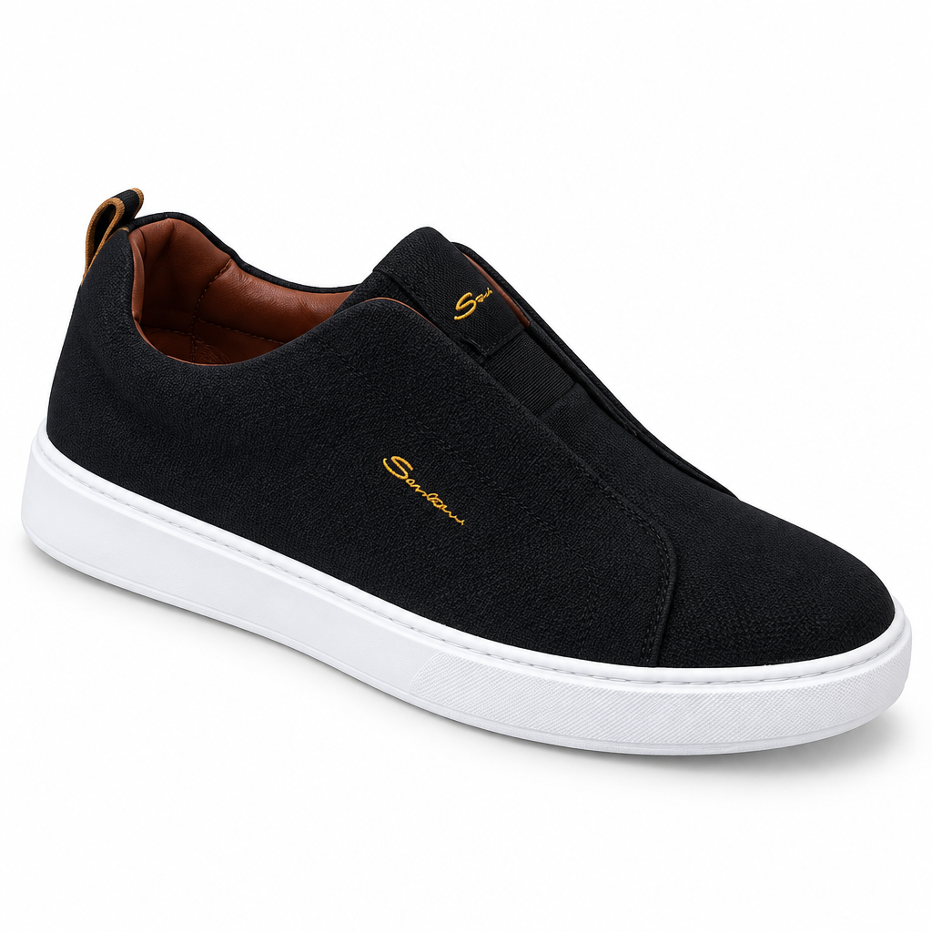 Deep black men's slip-on casual shoe with white sole on white background