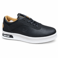 Black low-top lace-up sneaker with tan lining and white sole on white background