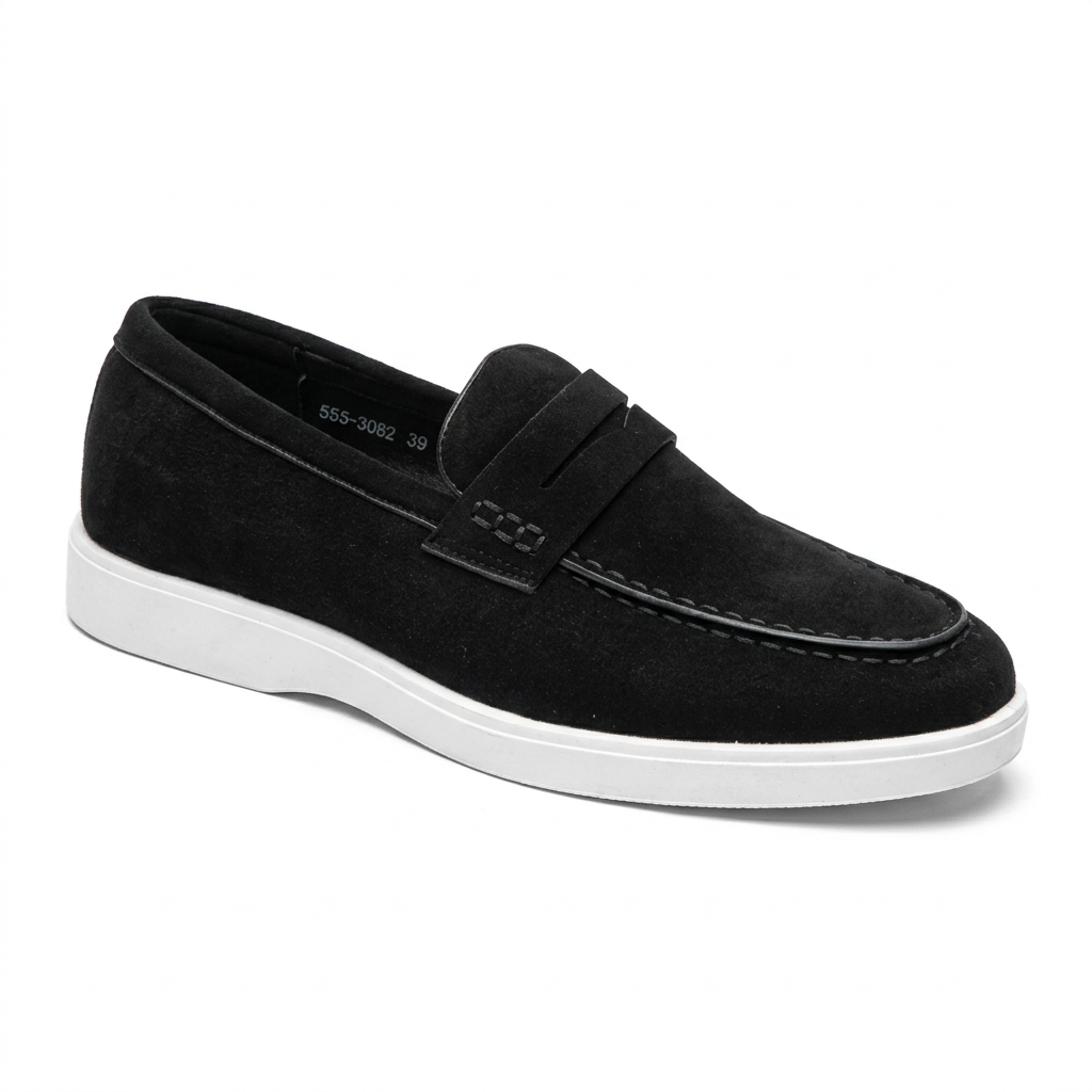 Black men's penny loafer with stitched strap and contrasting white sole on white background